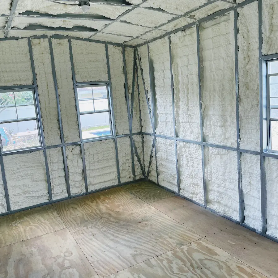 Closed-cell spray foam insulation applied to wall cavities in a residential project in Miami Springs